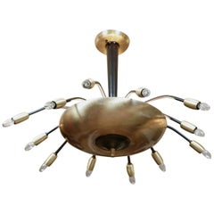 Modernist Twelve-Light Satin Brass and Black Enameled Chandelier