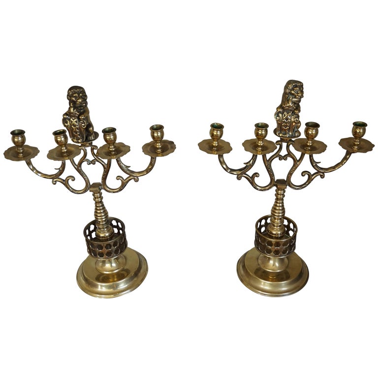 Large Pair of Brass Candelabras with Lions Holding the Coat of Arms of