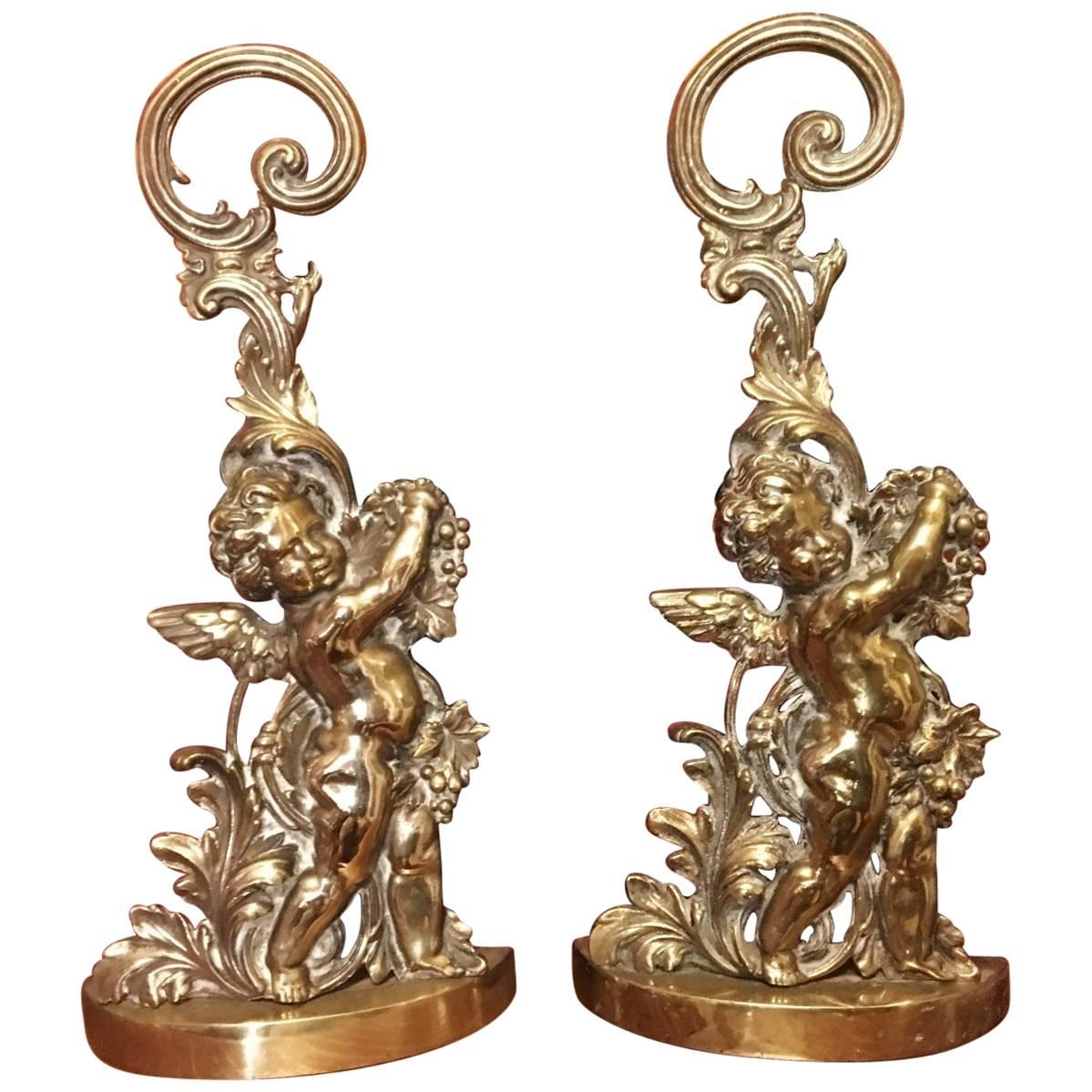 Two Early 20th Century Brass Cherub Door Stops