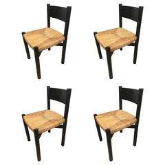 Charlotte Perriand Set of Four Black Model "Meribel" Rush Chairs
