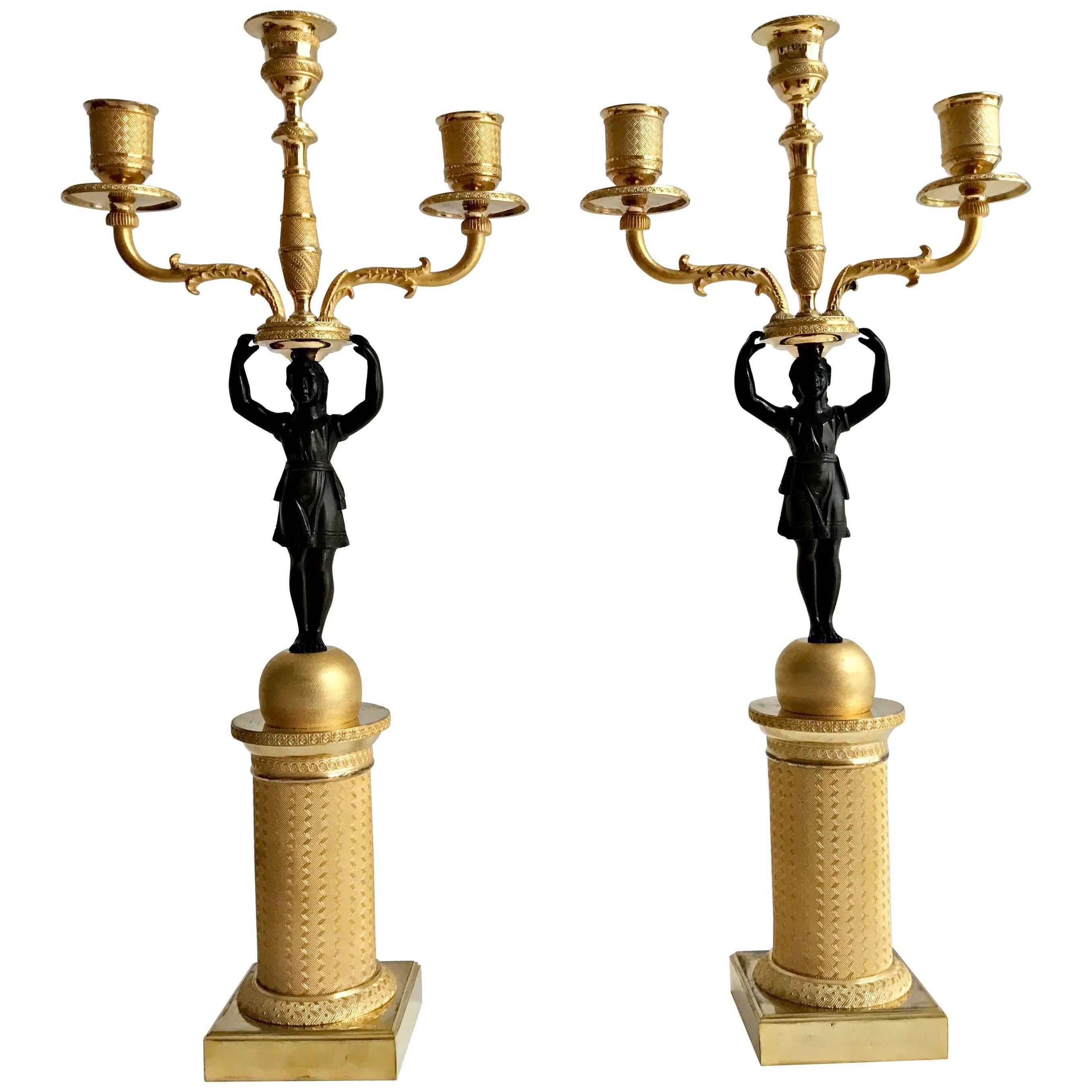Rare Pair of Empire Ormolu and Painted Candlesticks For Sale