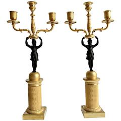 Rare Pair of Empire Ormolu and Painted Candlesticks