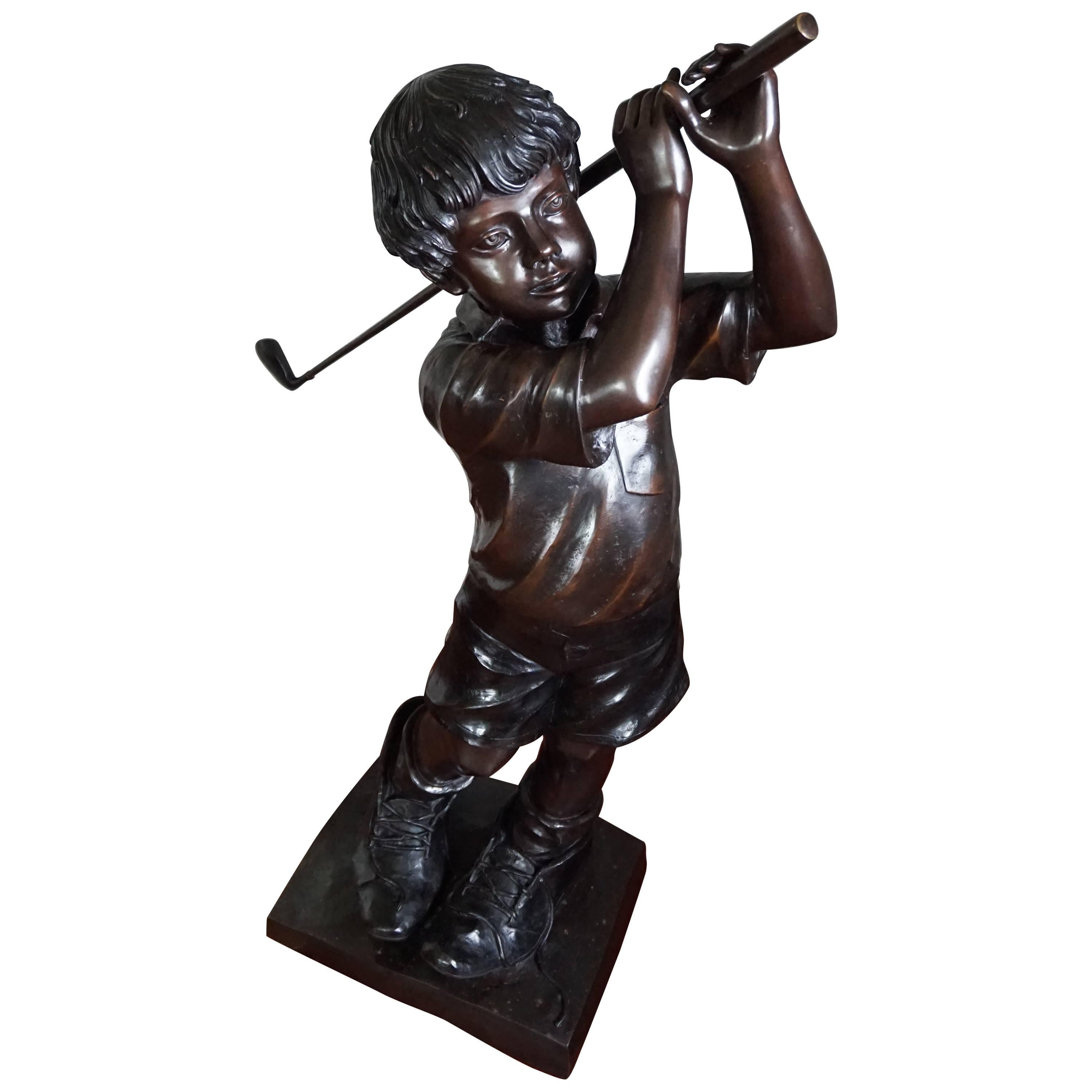 Life-Size and Signed Bronze Sculpture of Golf Playing Boy in His Father's Shoes