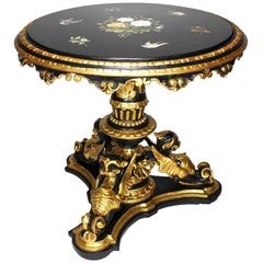 Italian 19th-20th Century Ebonized and Parcel Giltwood Carved Pietra Dura Table