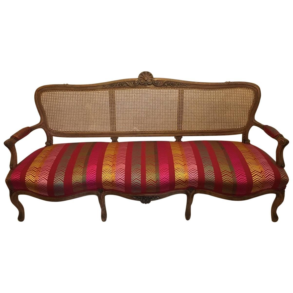 Early 20th Century French Louis XV Style Caned Back Settee