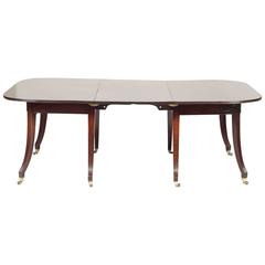 English Regency Mahogany Dining Table with Dramatic Saber Legs