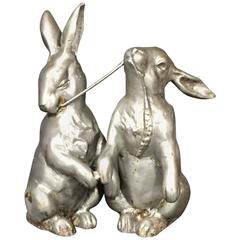 Pair of Vintage Cast Metal Rabbits Sharing a Sheaf of Wheat