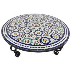 Table basse ronde en mosaïque marocaine sur base en fer