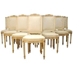 Set of Twelve Louis XVI Painted and Parcel-Gilt Dining Chairs 1
