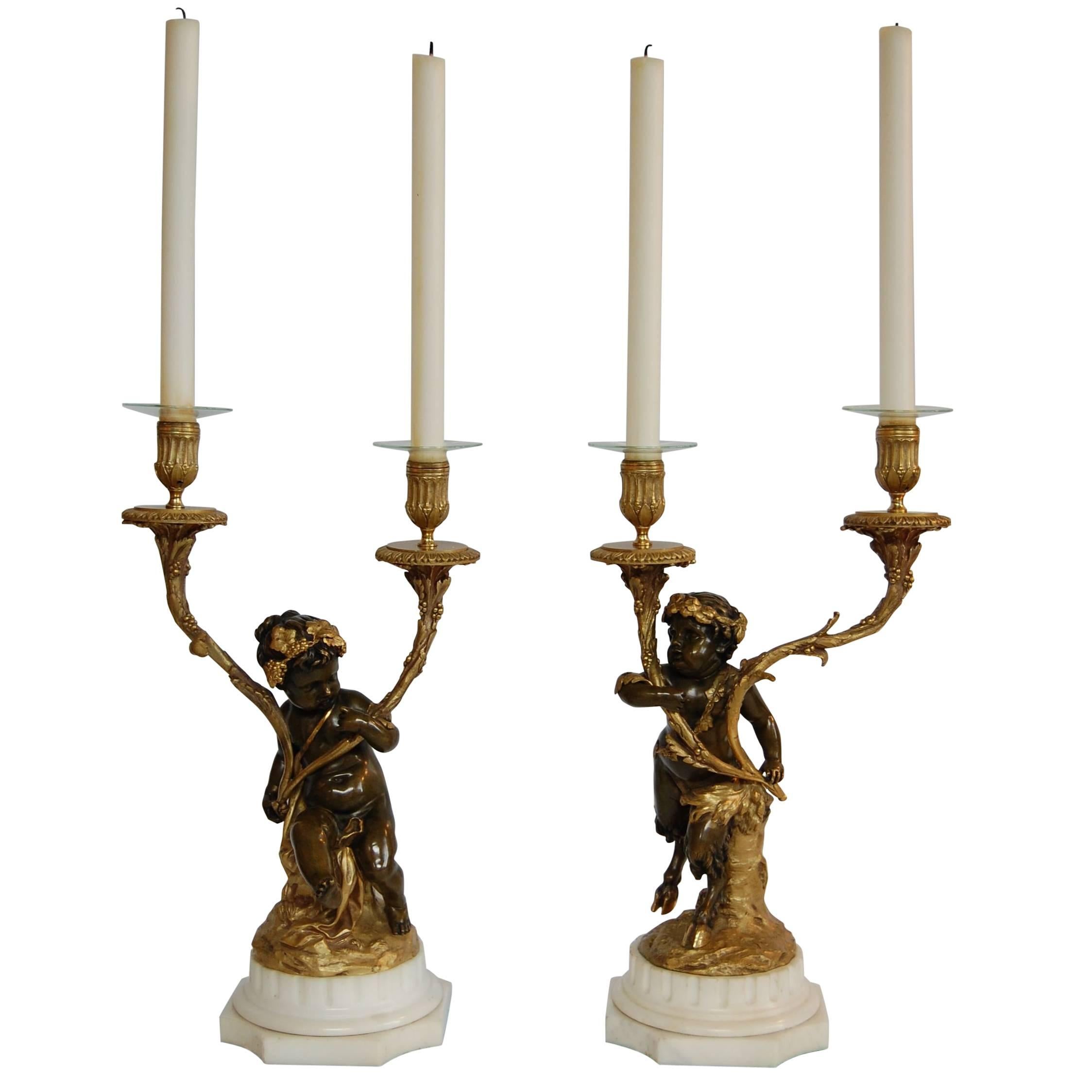 Pair of Gilt and Patinated Two-Light Candelabra, Signed "Clodion" For Sale