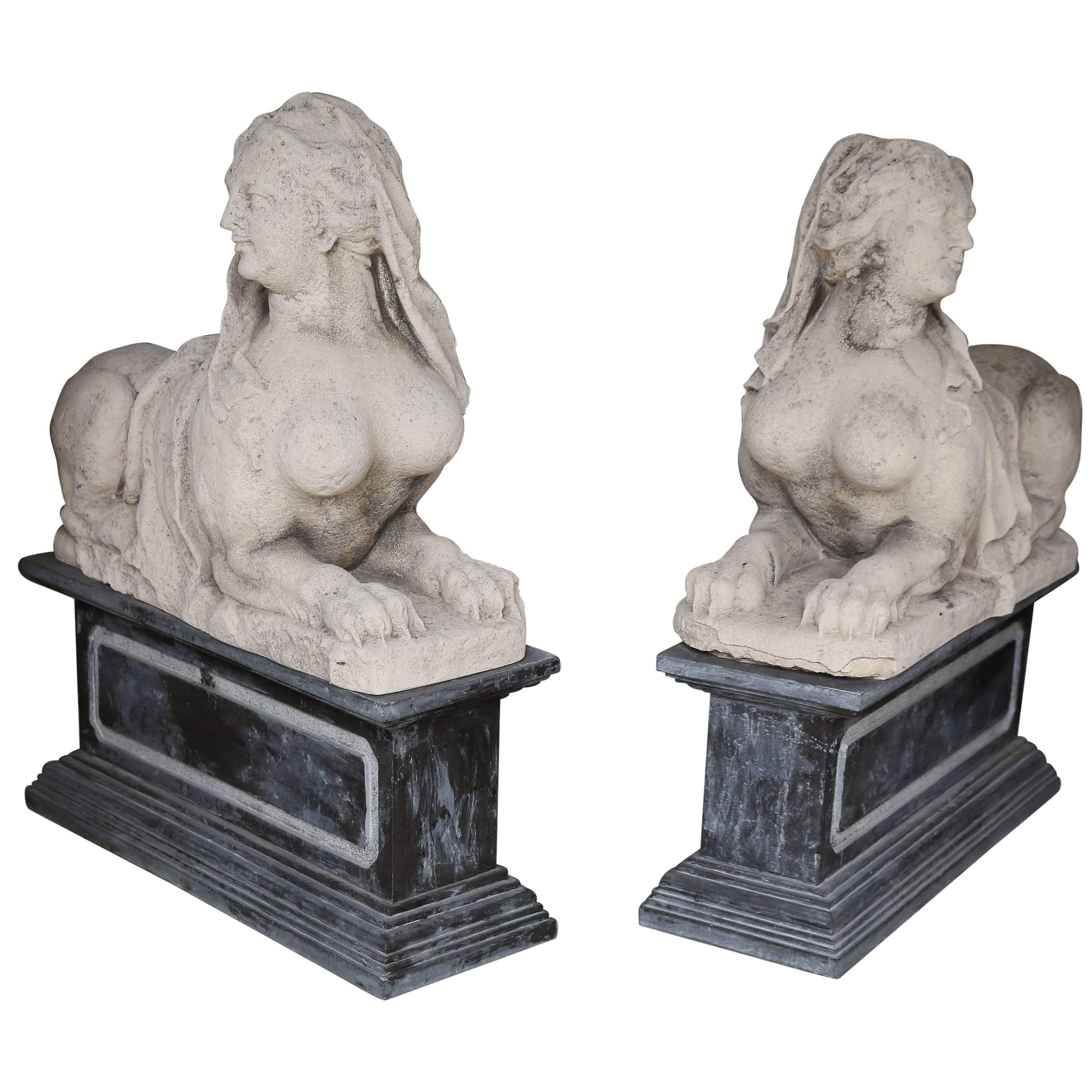 Pair of Antique Carved Limestone Sphinx on Marble Bases