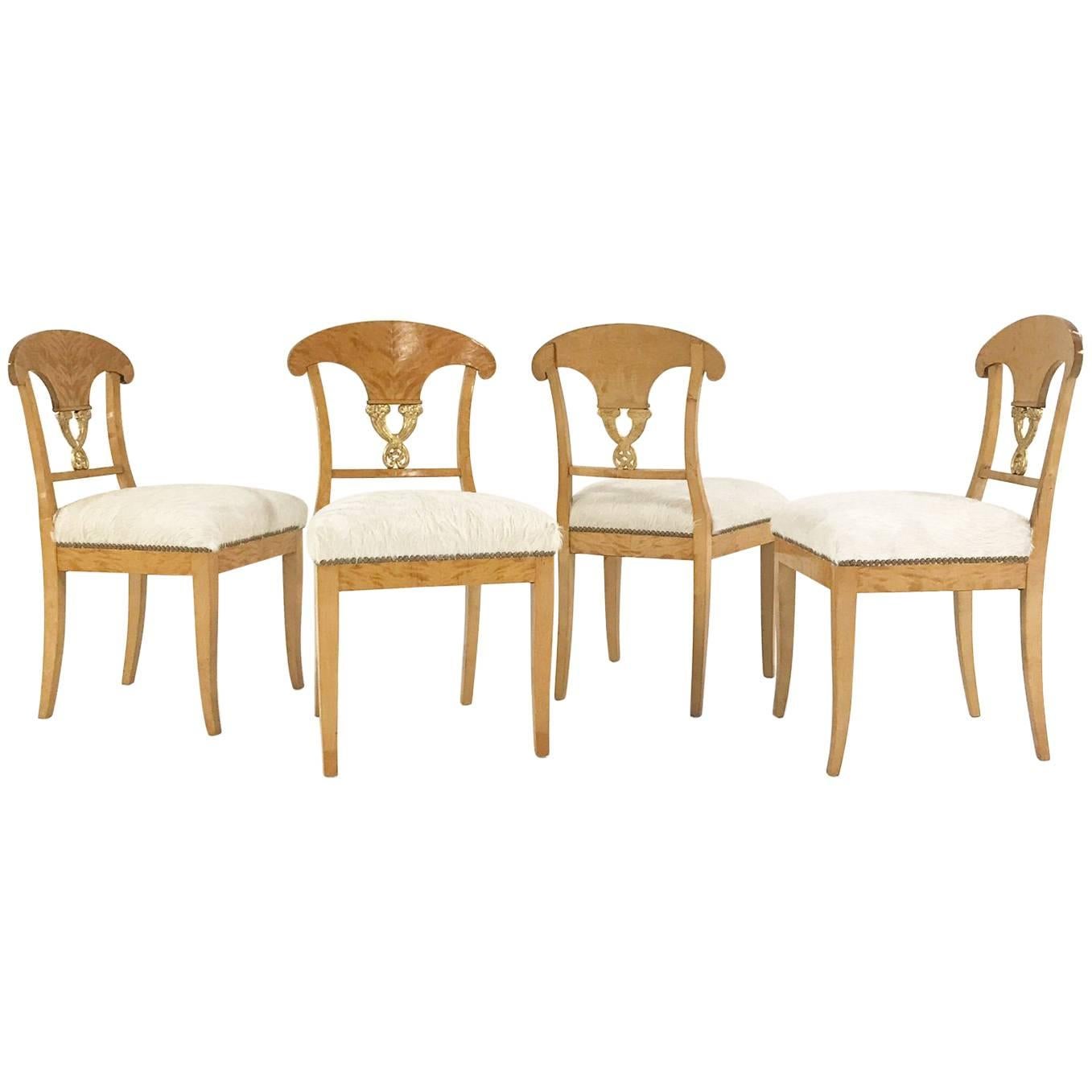 Set of Four Satin Birch Biedermeier Chairs in Ivory Brazilian Cowhide circa 1820