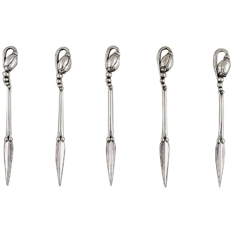 Georg Jensen Cinque raccoglitori di noci in argento, 'Magnolia', 1915-1930 in vendita