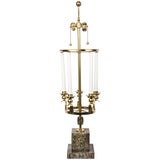 Lampe de bureau avec quincaillerie en laiton et base en faux marbre dans le style de Parzinger