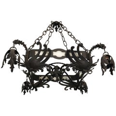 Unique Hand-Forged Wrought Iron Chandelier with Four Winged Griffin Sculptures