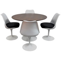 Eero Saarinen for Knoll Tulip Dining Set with Four Swivel Chairs and Table