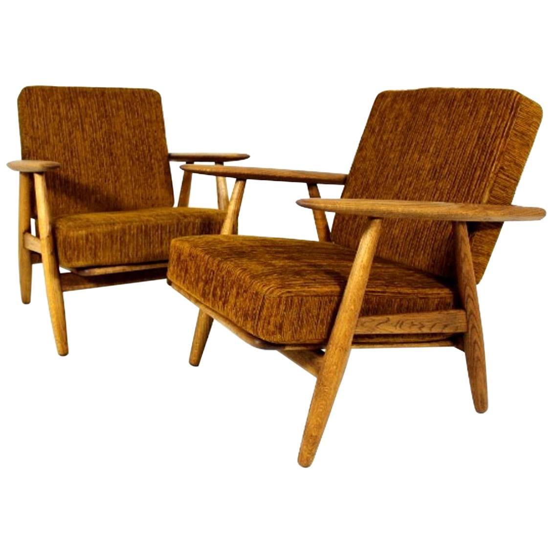 Pair of  Hans J Wegner Cigar Lounge Chairs Model GE 240 in Oak and Fabric