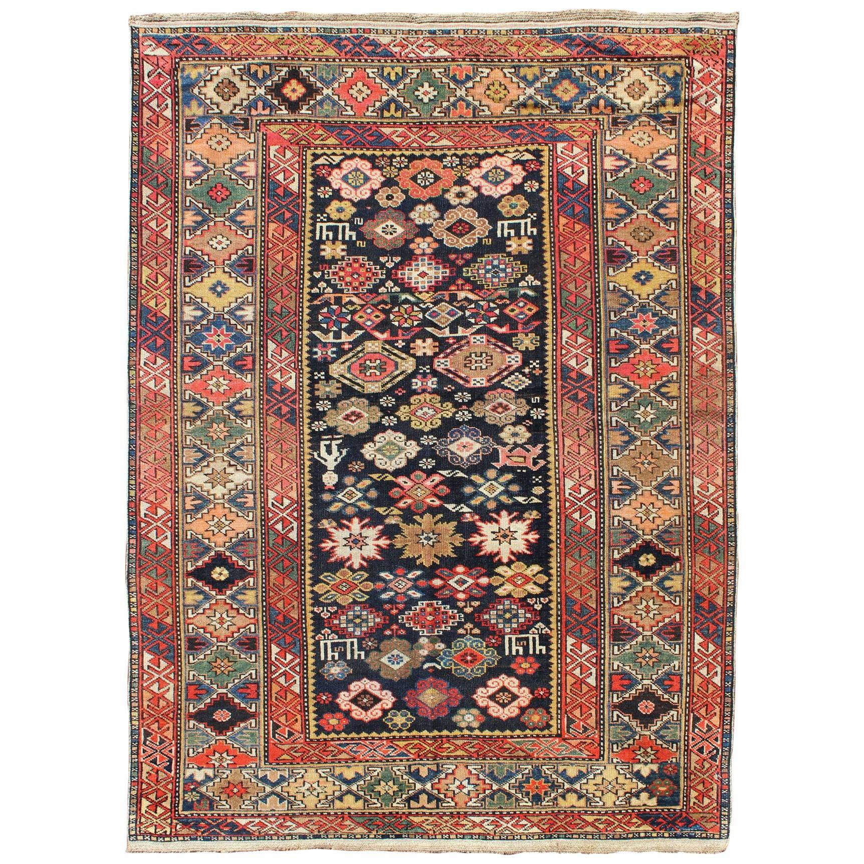 Colorful Antique Kuba Carpet with Intricate Geometric Design For Sale