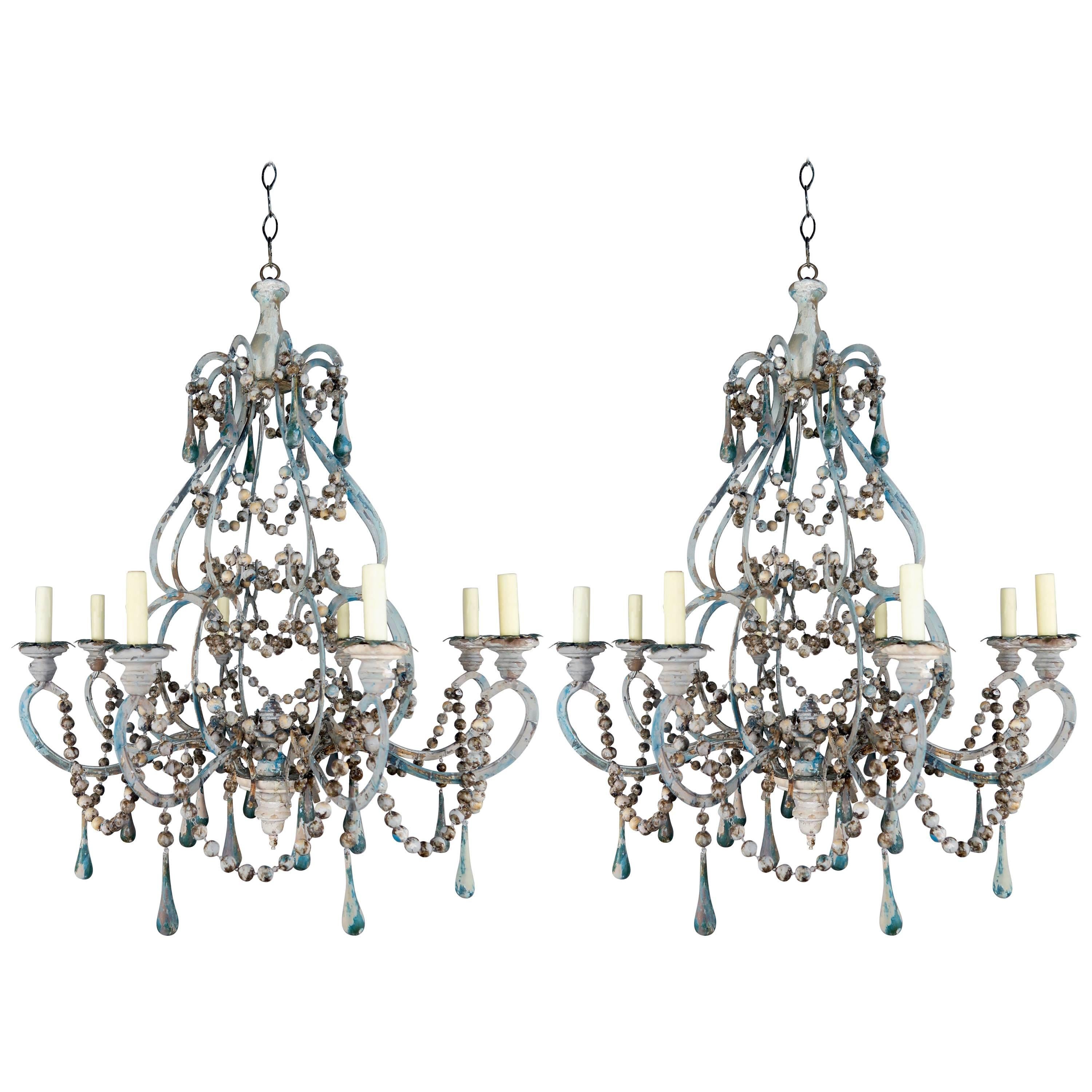 Pair of Eight-Light Wood Beaded and Metal Painted Chandeliers