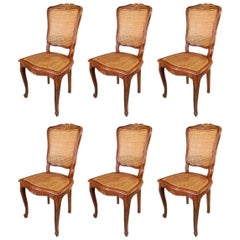 Set of Six French Carved Walnut Dining Chairs in Style of Louis XV
