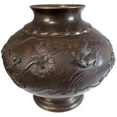Meiji Period Japanese Bronze Vase with Raised Birds, Branches and Foliage