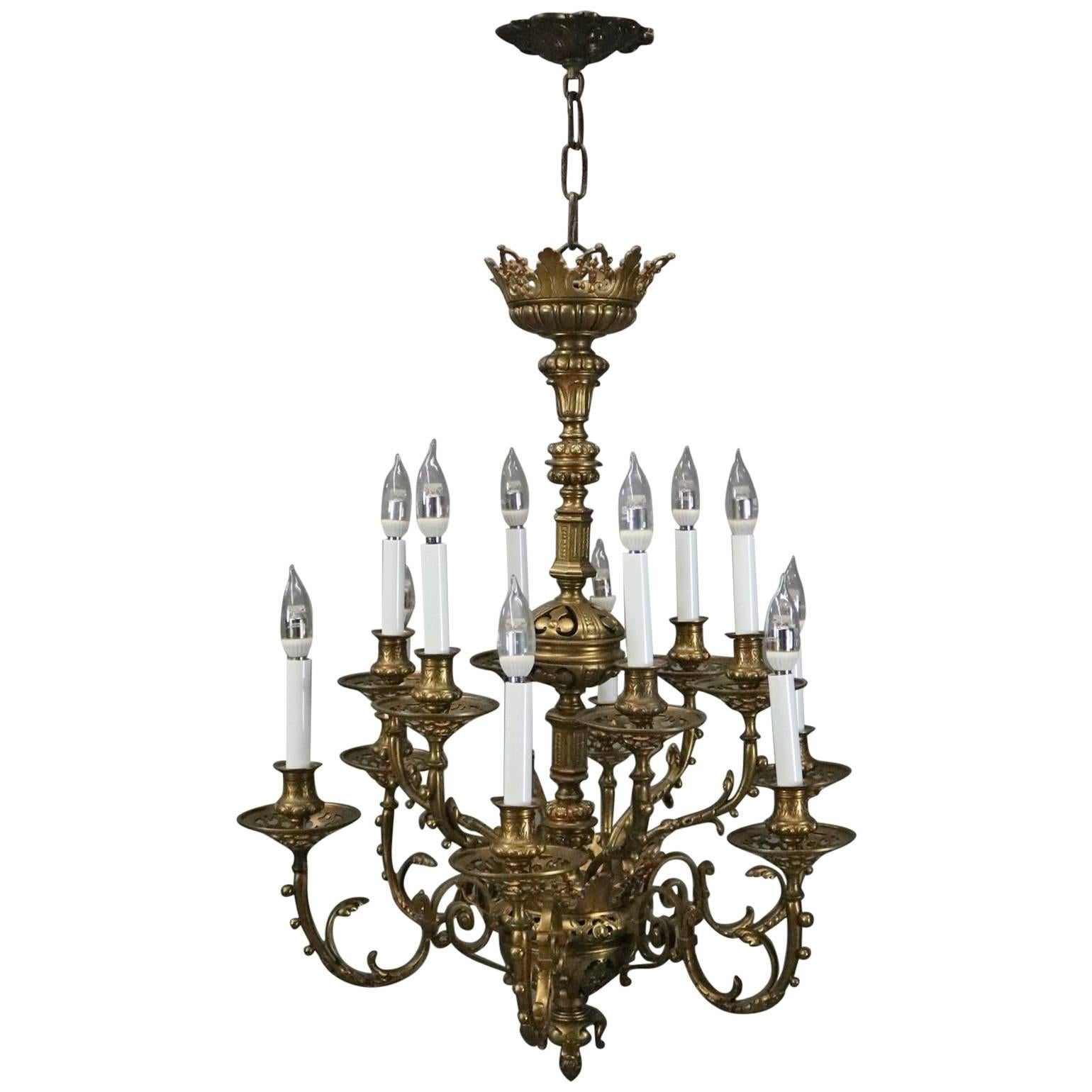 French Louis XV Scroll & Foliate Eleven-Light Bronze Chandelier, circa 1930