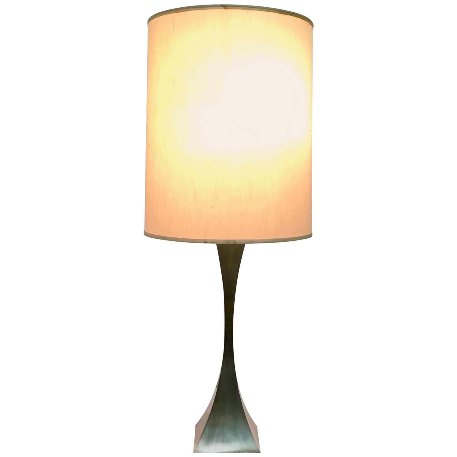 Made in Italy.
This table lamp was designed by Tonello and Montagna Grillo for High Society, in 1972. 
Its structure is in chrome-plated metal.
This lamp is a vintage piece, therefore it might show slight traces of use, but it can be considered as