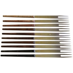 Set of Ten Used Modern Steel Fondue Forks with Wood Handles by Carl Auböck