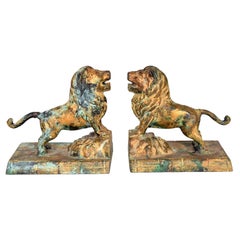 Hollywood Regency Cast Iron Lion Bookends with Faux Bronze Patina