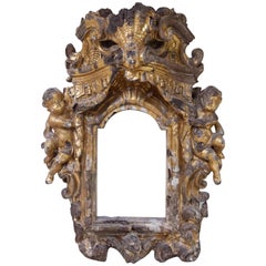 Cornice barocca in legno di noce dorato del XVII secolo