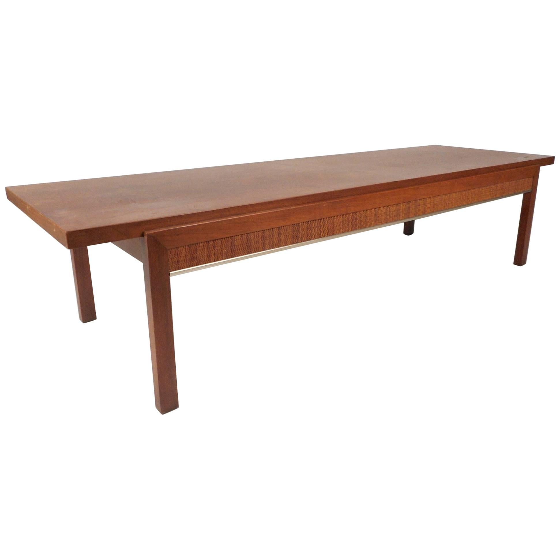 Mid-Century Modern Walnut Coffee Table with Cane Sides For Sale