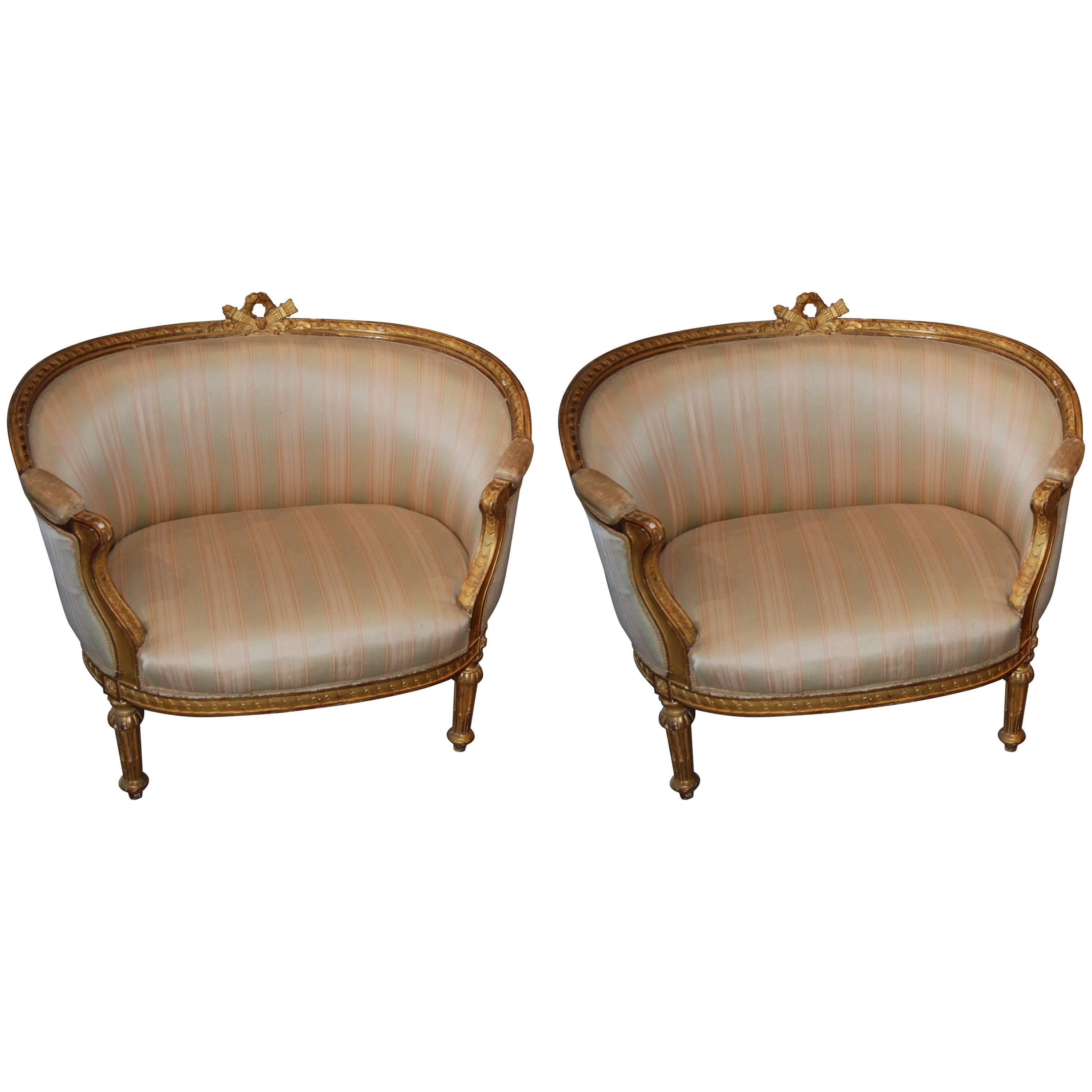 Exceptional Pair of Carved and Gilded Marquis Armchairs