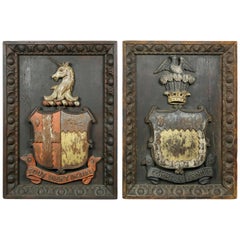 Two European Carved and Painted Oak Coats of Arms