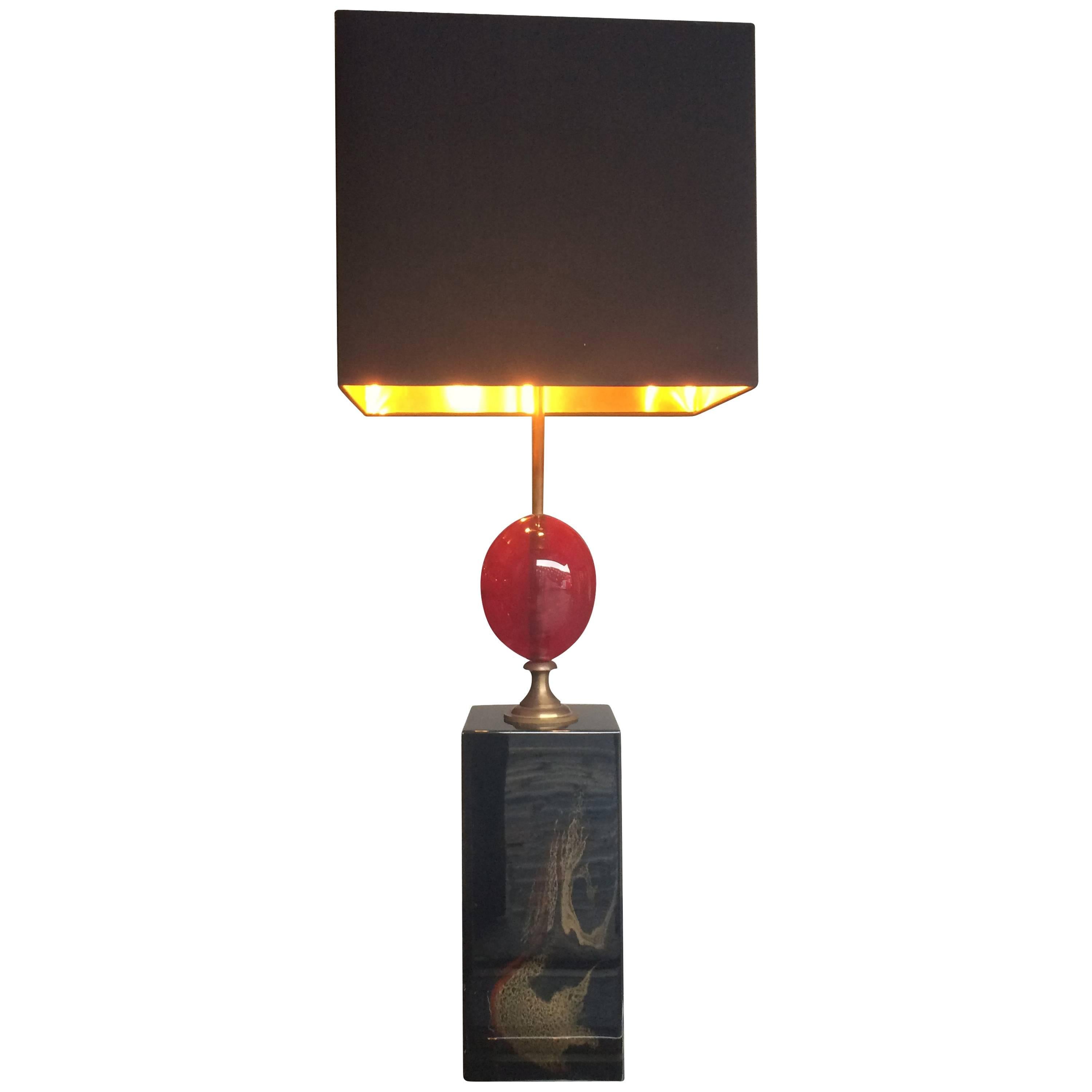 Grande lampe œuf en résine rouge de la Maison Charles