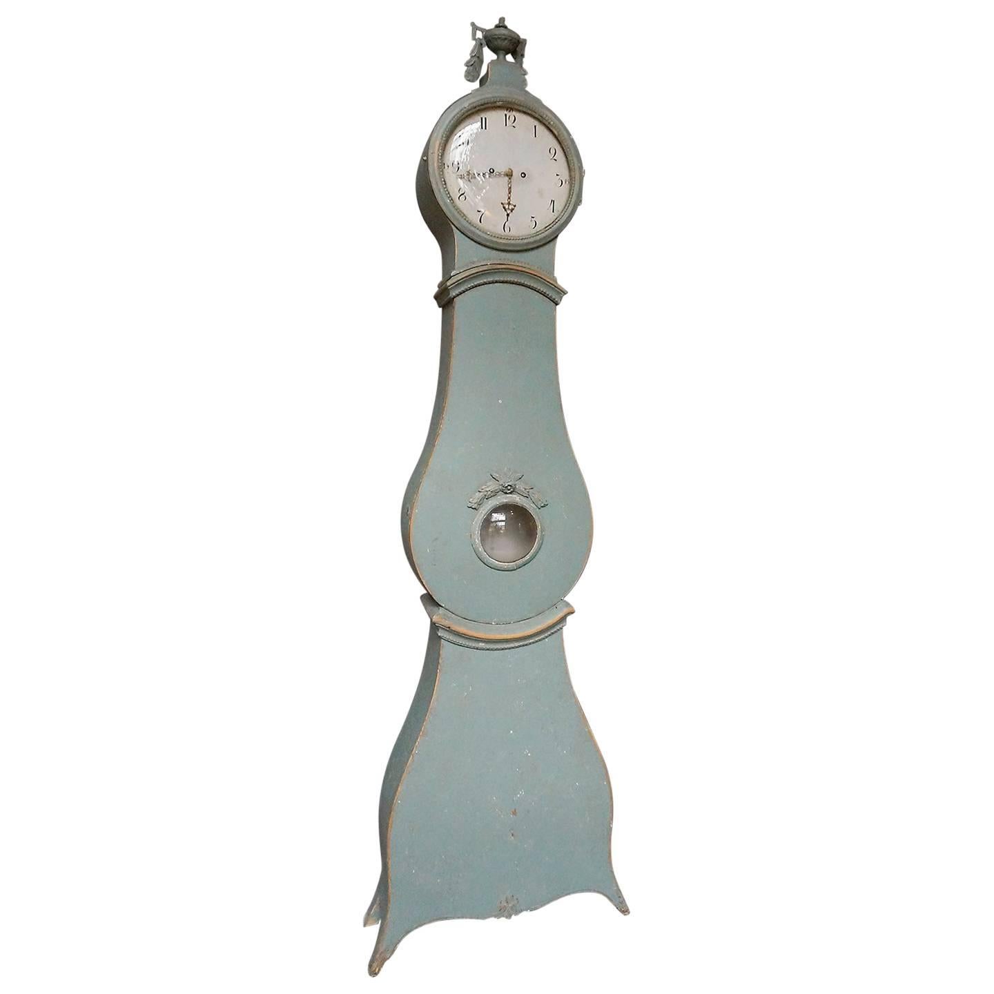 Early Mora Clock with Carved Urn Finial