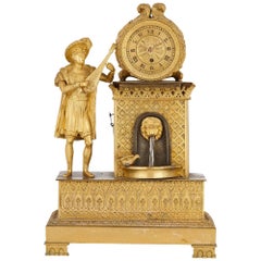 Pendule de cheminée française ancienne en bronze doré avec décoration de cascade
