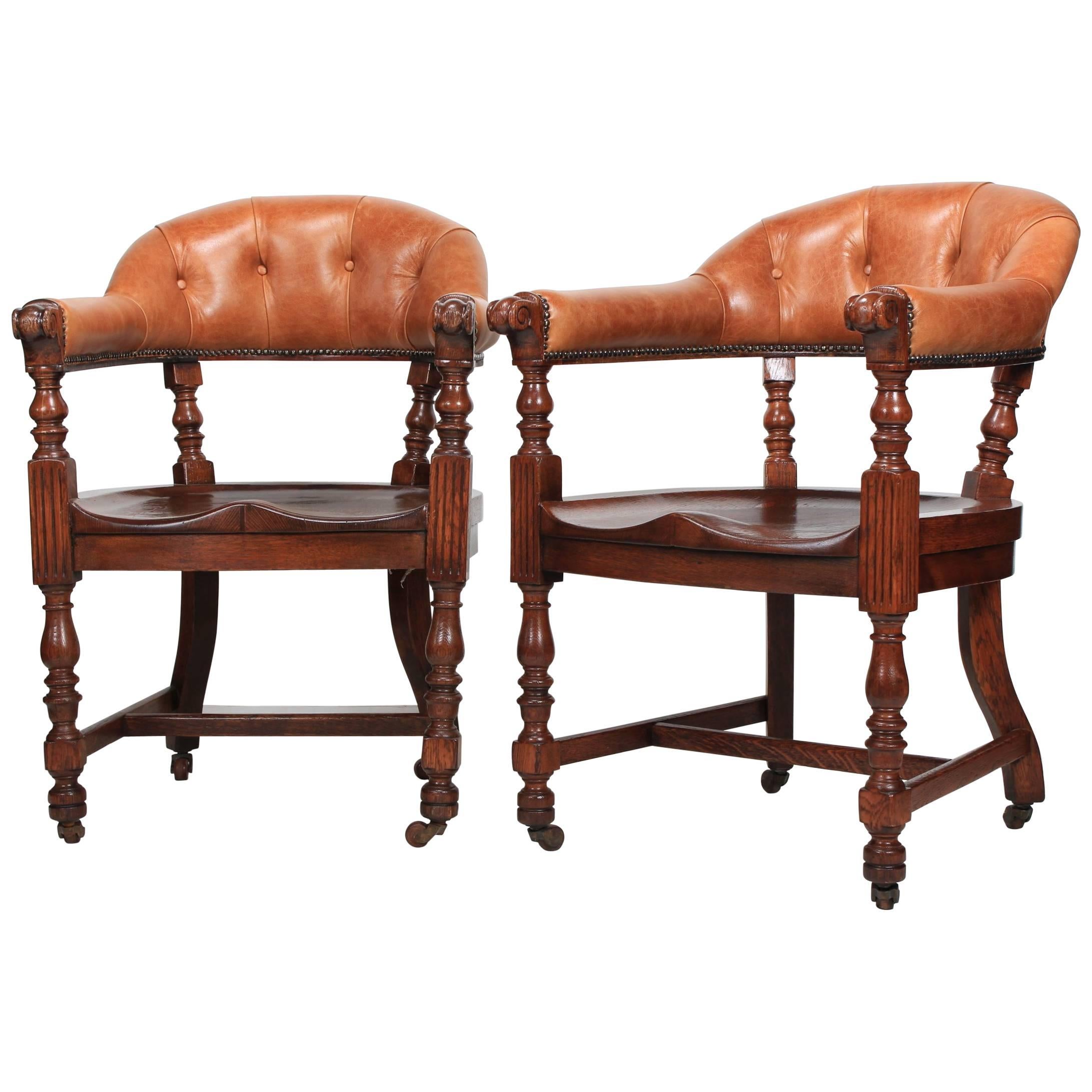 Pair of Oak and Leather Library Captains Desk Chairs For Sale