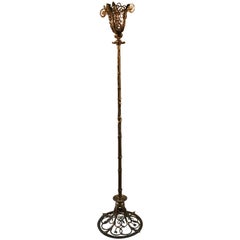 Lampe torchère sur pied Art Déco en bronze