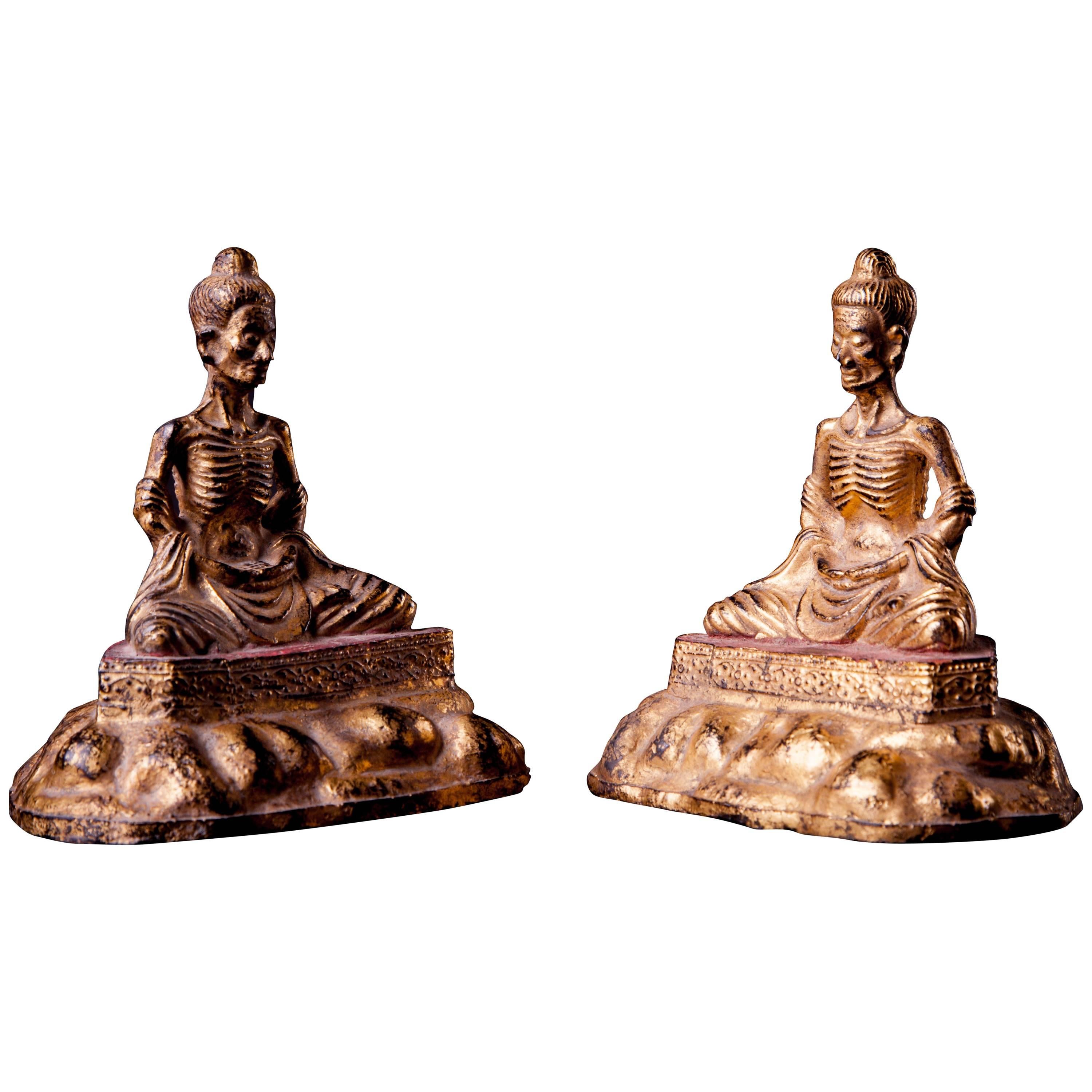 Two Gilded and Lacquered Bronze Fasting Buddha For Sale