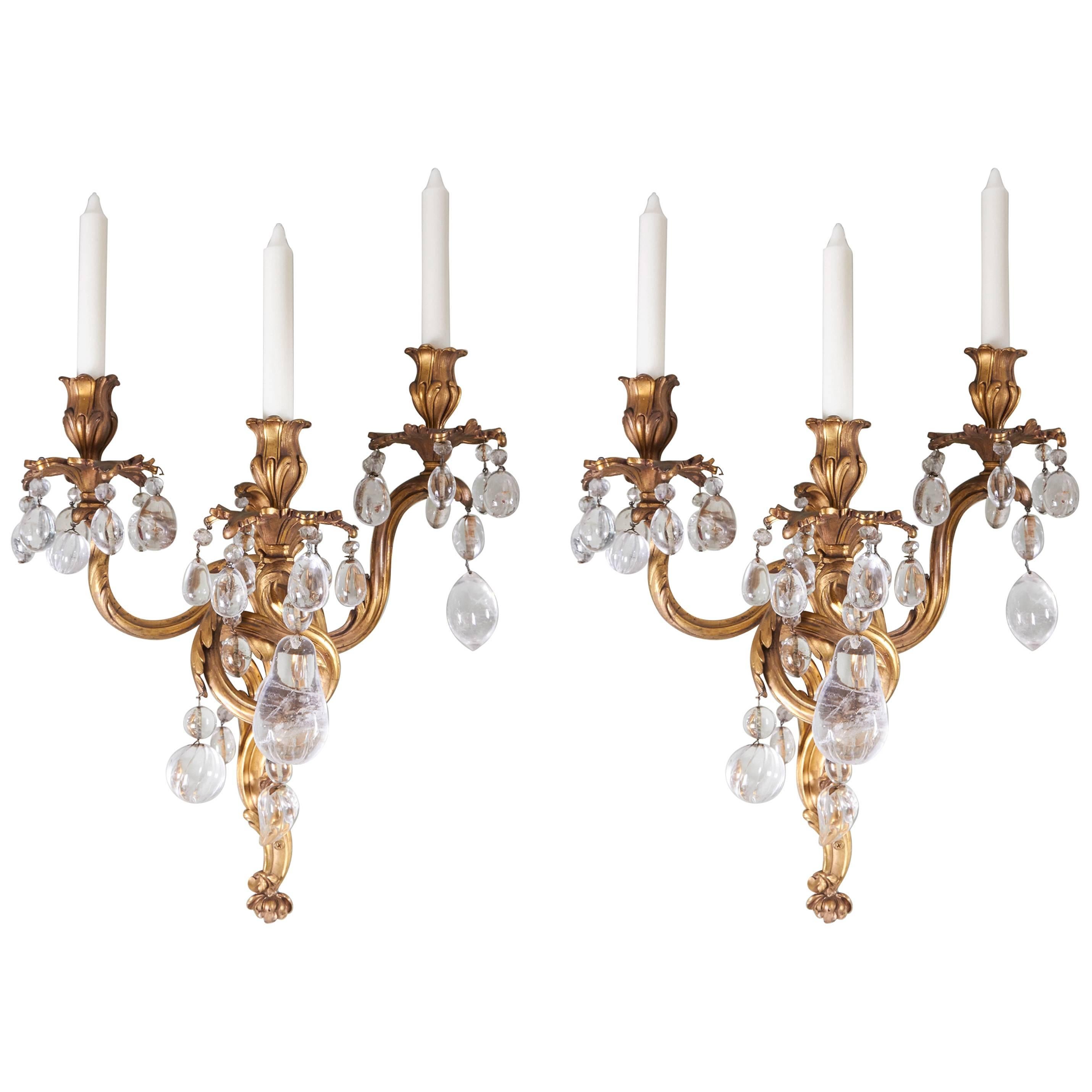 A Pair of Louis XV Style Bronze Dore and Rock Crystal Sconces  For Sale