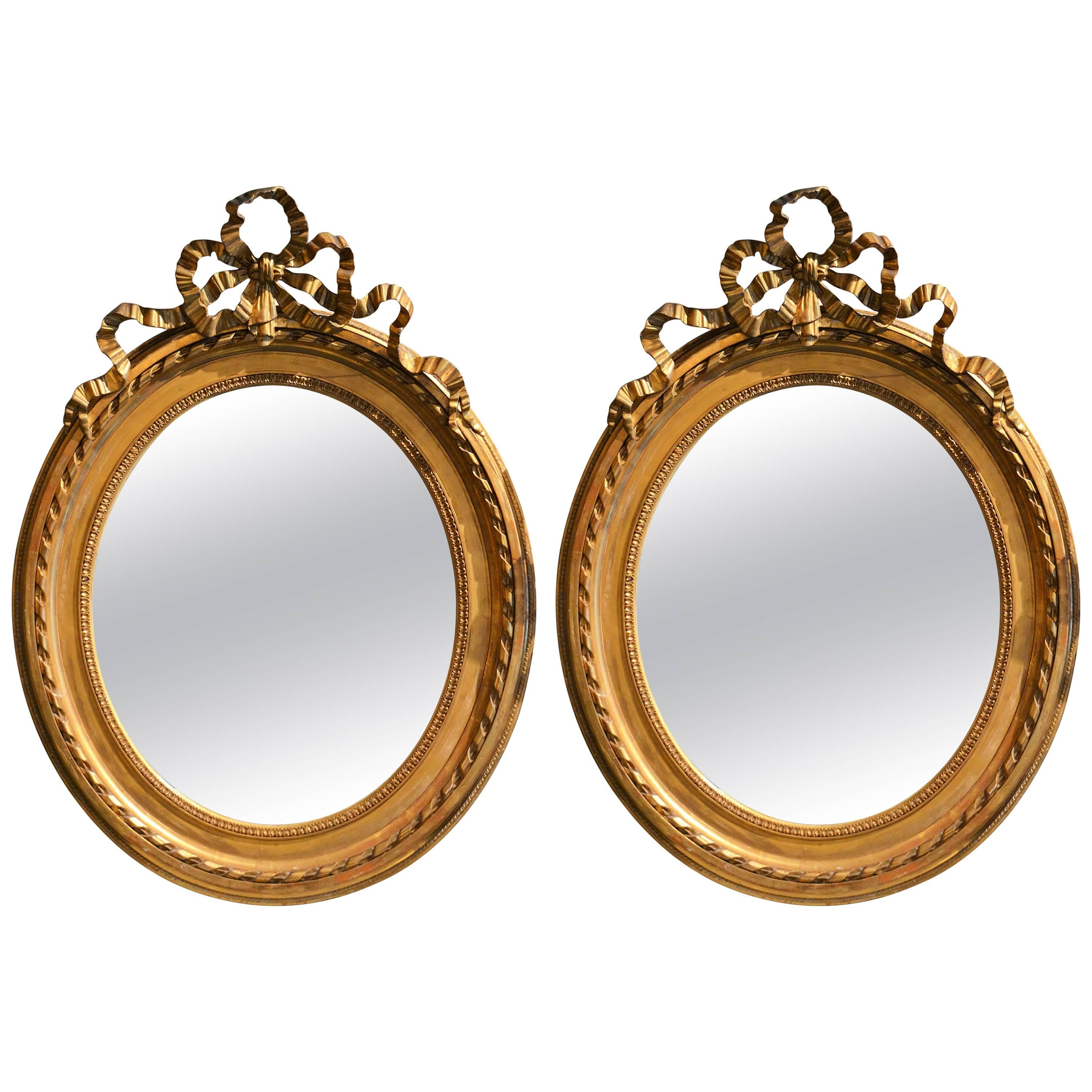 Pair of Antique French Louis XVI Oval Mirrors