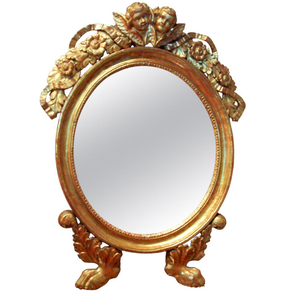 Miroir en bois doré italien ou français avec putti ou chérubins en doré citronnier