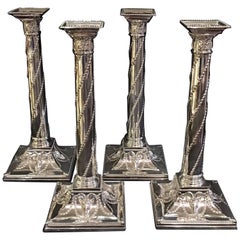 Fine Set of Four Adan Style Silver Candlesticks