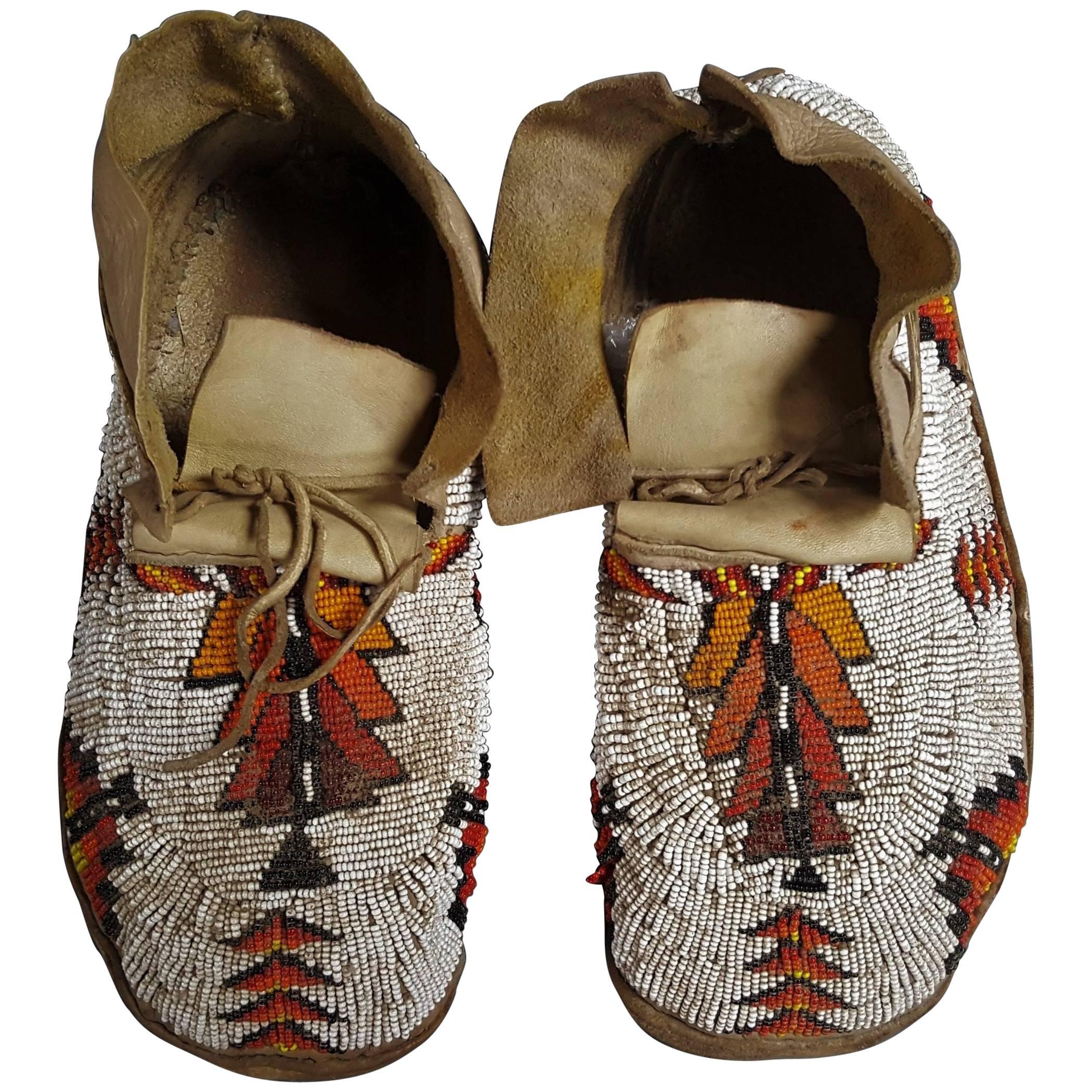 Pair of Plains Indians Moccasins, USA, Early 20th Century For Sale