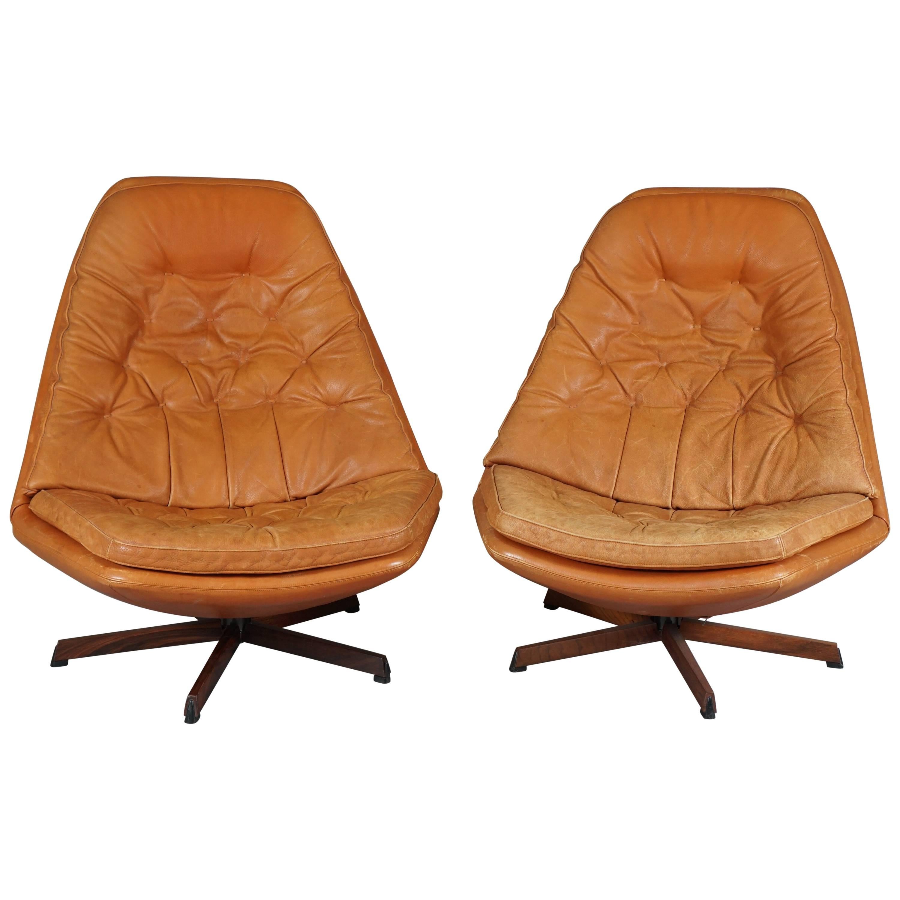 Pair of Swivel Chairs and Ottomans by Madsen & Schubell