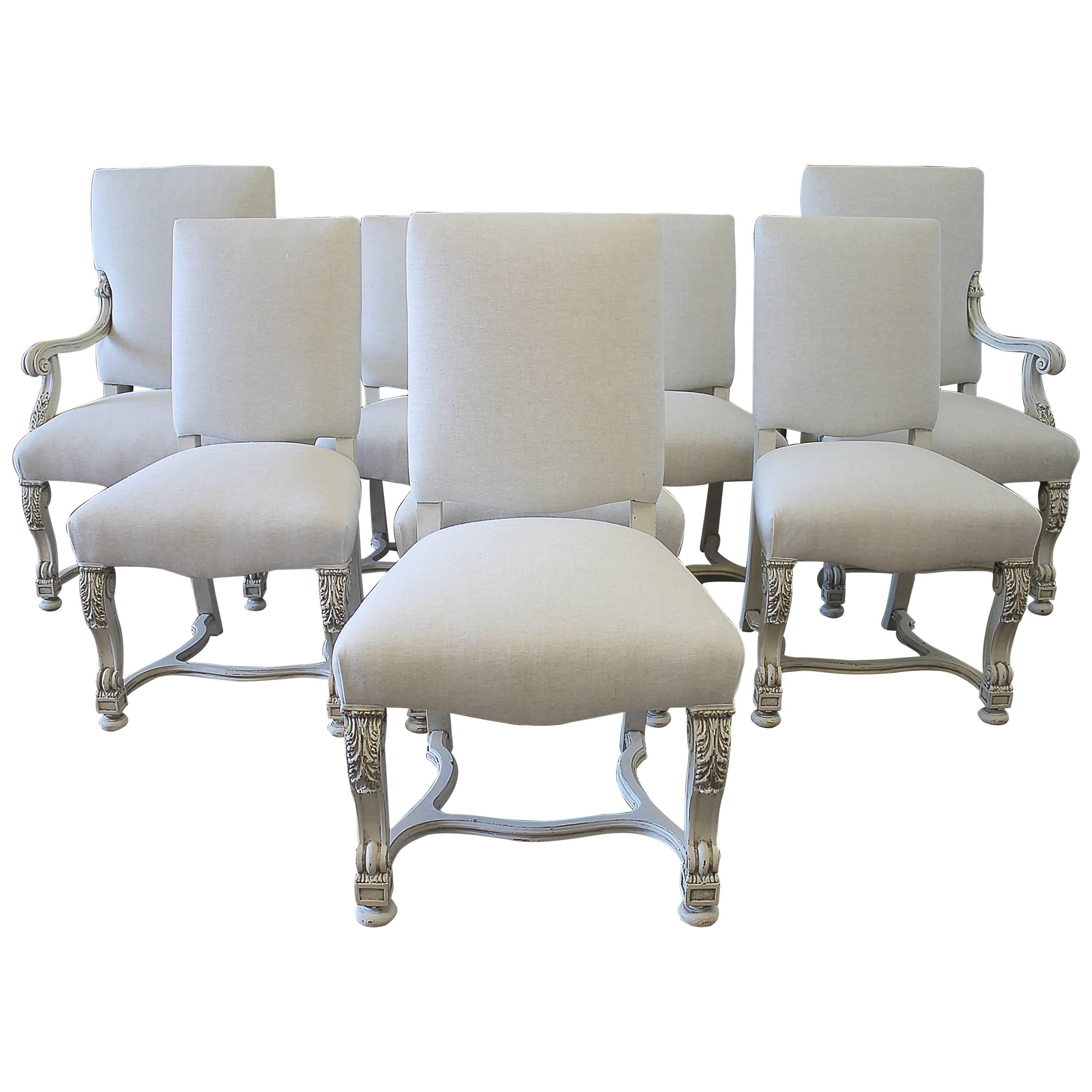Set of Eight Carved and Linen Upholstered Renaissance Dining Chairs