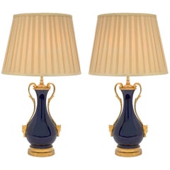 Pair of French Louis XVI Style Cobalt Blue Sèvres Porcelain and Ormolu Lamps