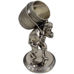 Silver Victorian Era Aesthetic Movement Figural Napkin Ring, Man Toting Barrel