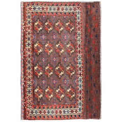 19th Century Antique Tekke Rug with Brown Field and Tribal Motifs in Red