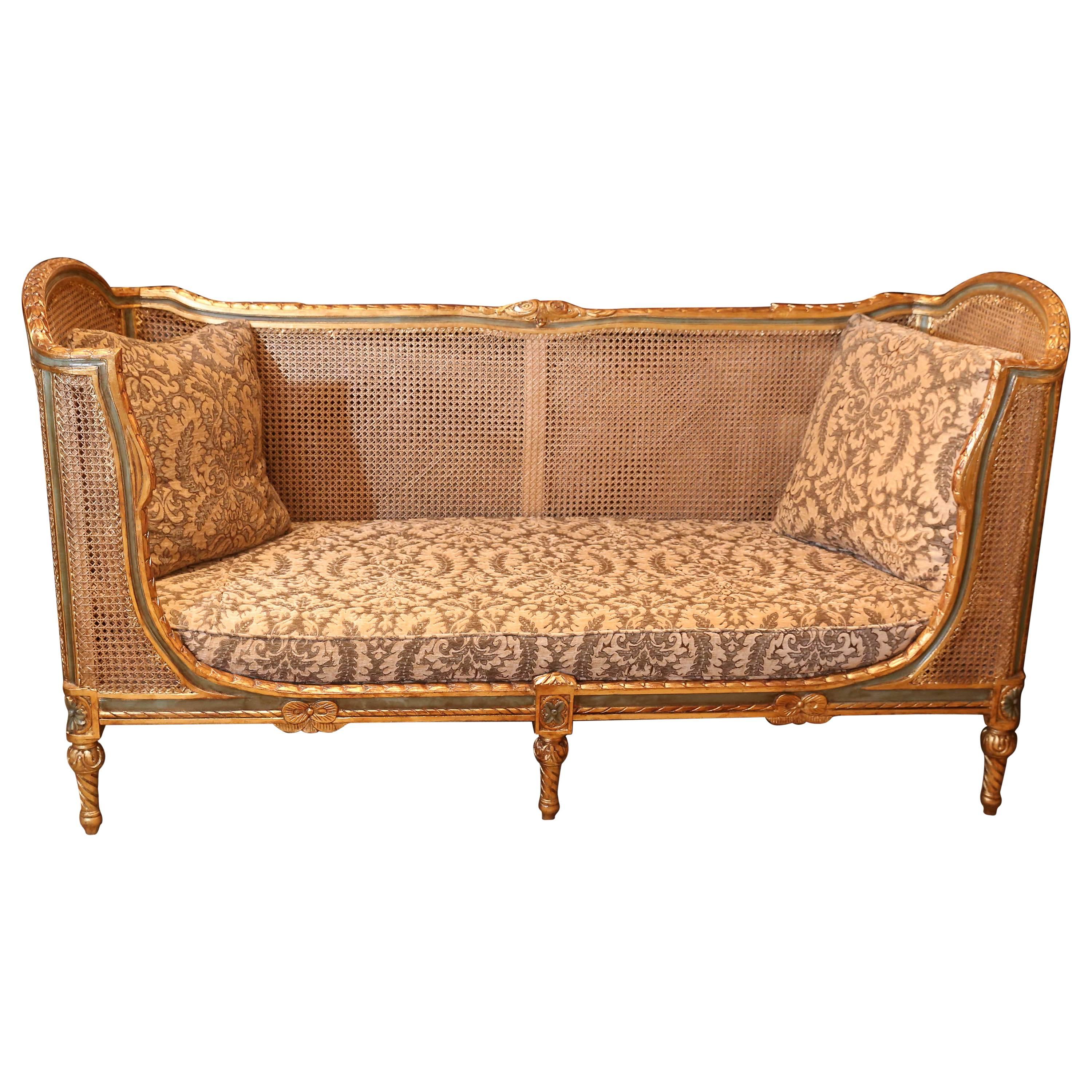Italian gilt wood with parcel paint sofa and double Cain frame